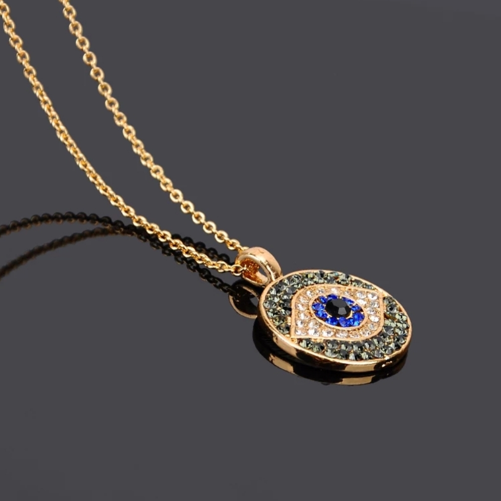 Goldtone Rhinestone Eye Pendant Necklace - Picture 3 of 5